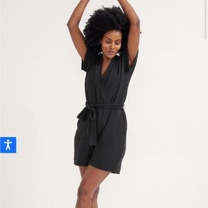 Nursing romper brand new in plastic